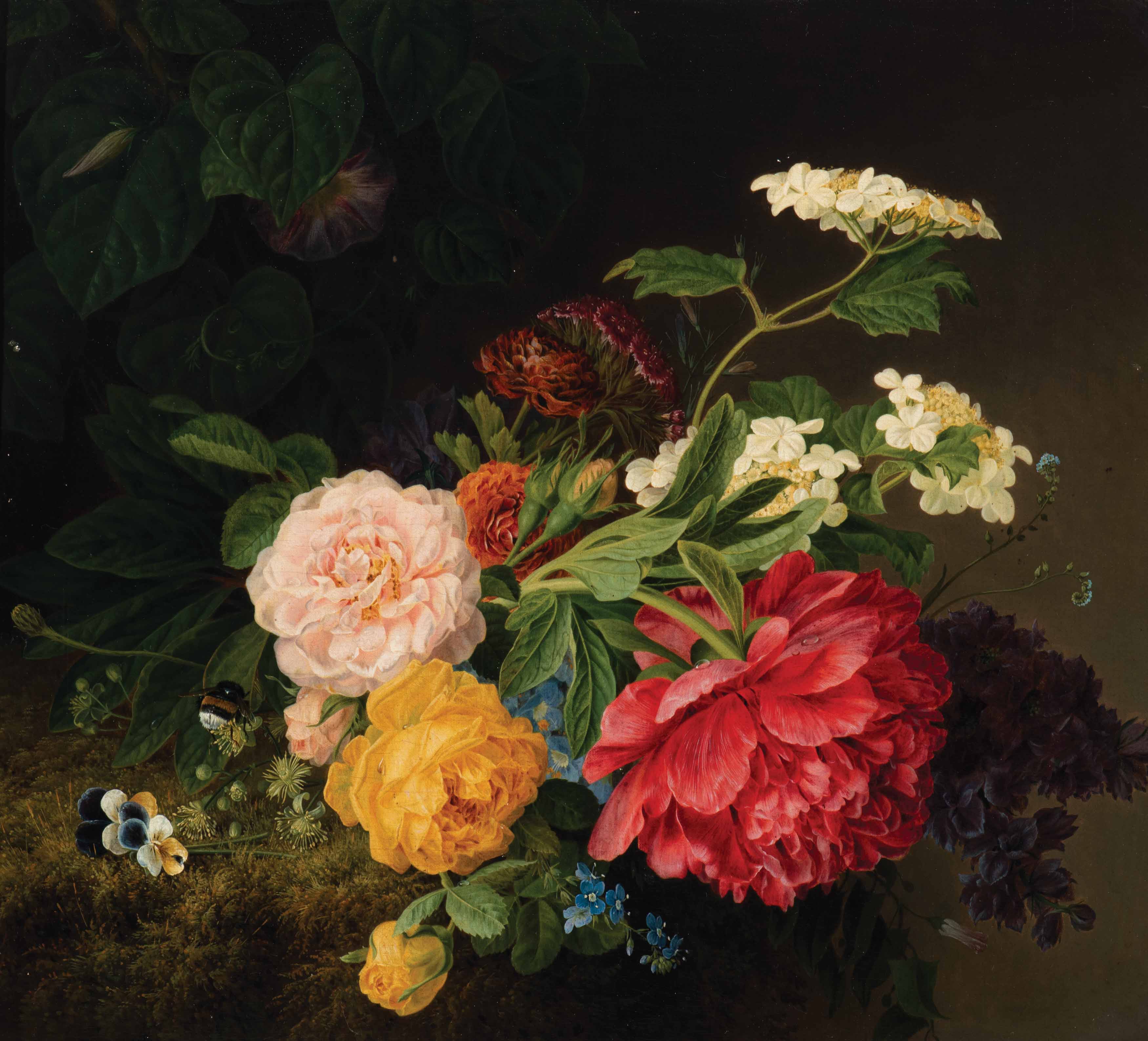 A bouquet of summer flowers on moss