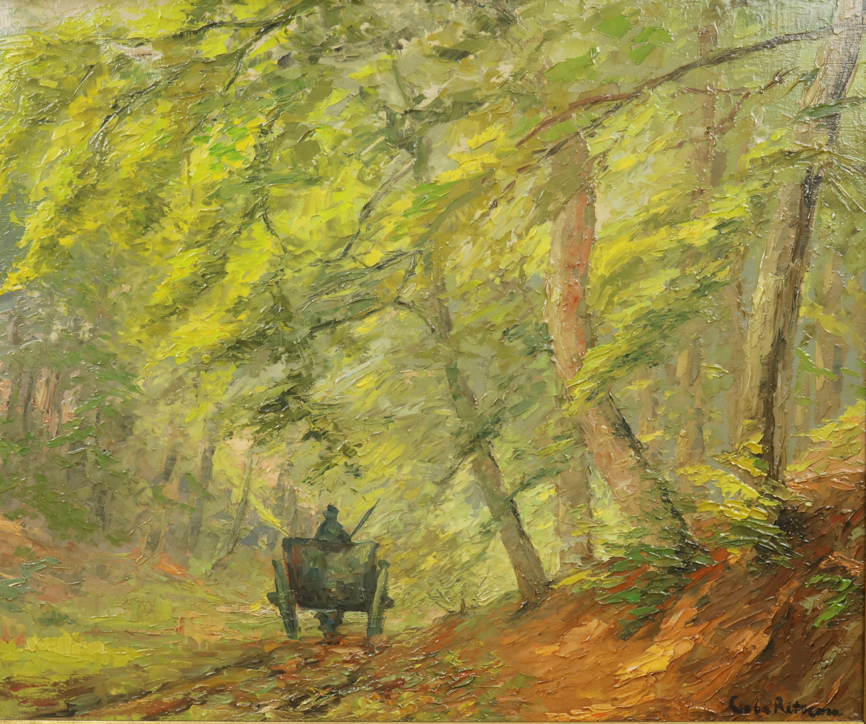 Man met paard en wagen op een bospad