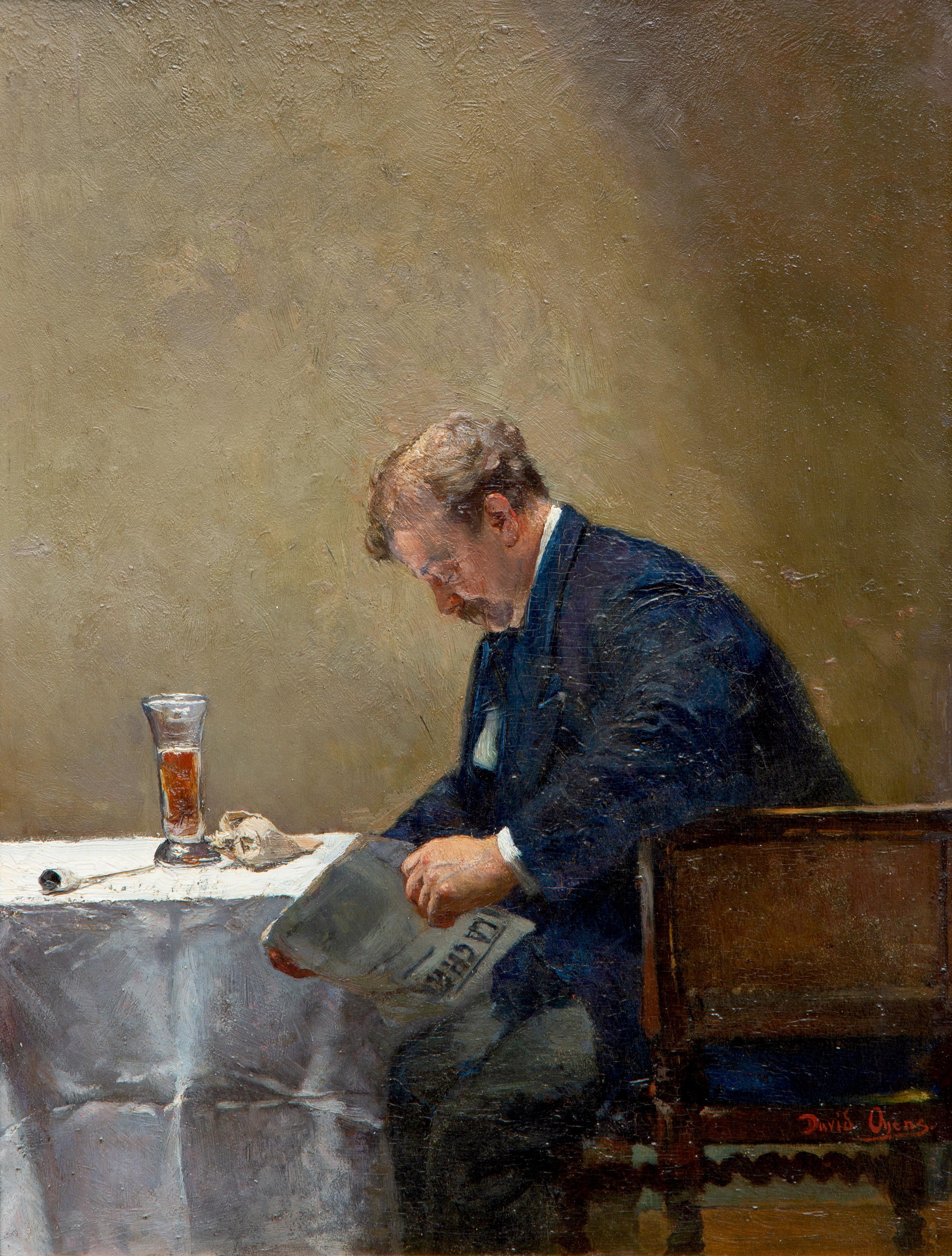 The artist enjoying the newspaper and his glass of beer