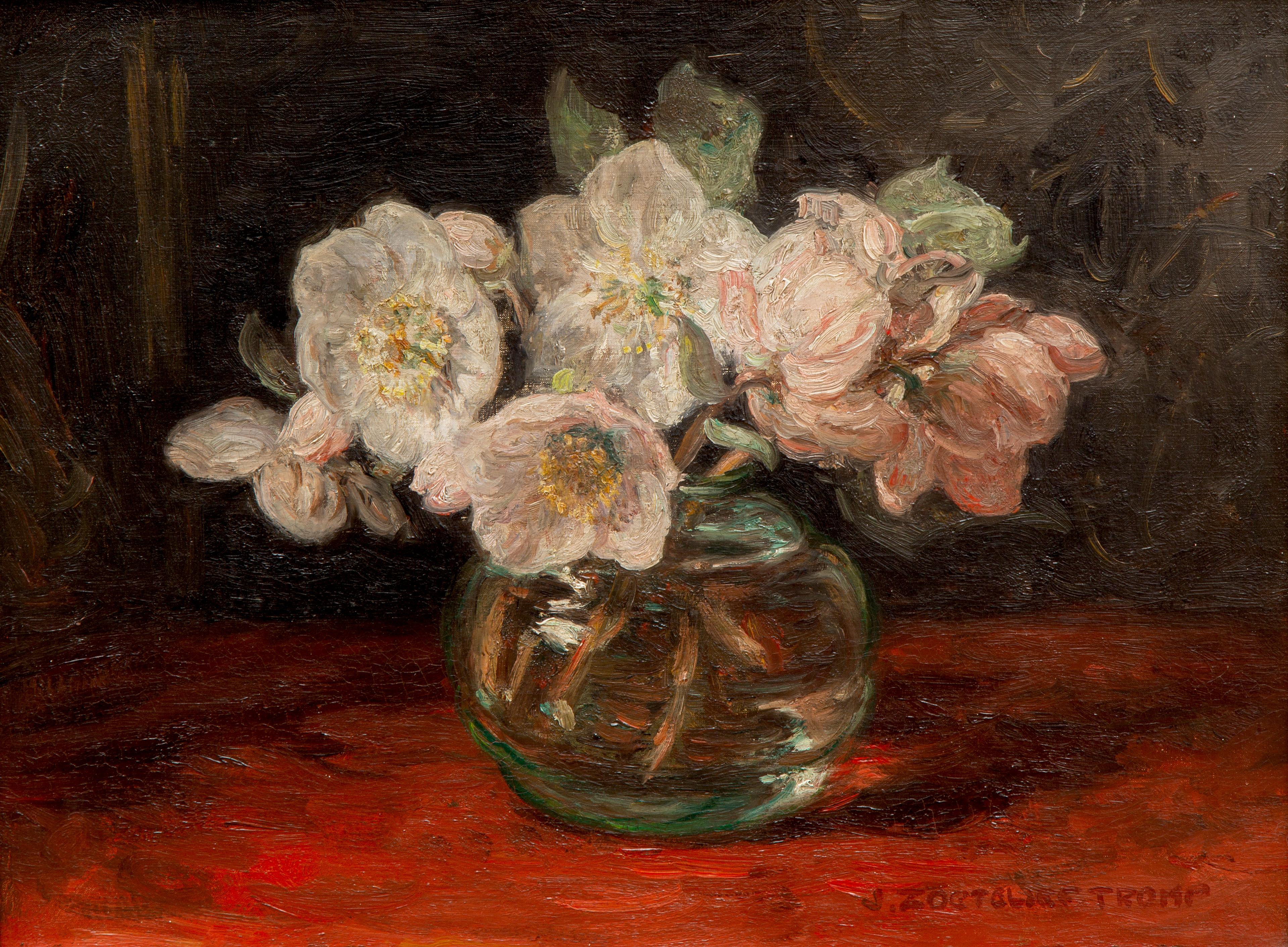 A still life with rose blossom in a glass vase