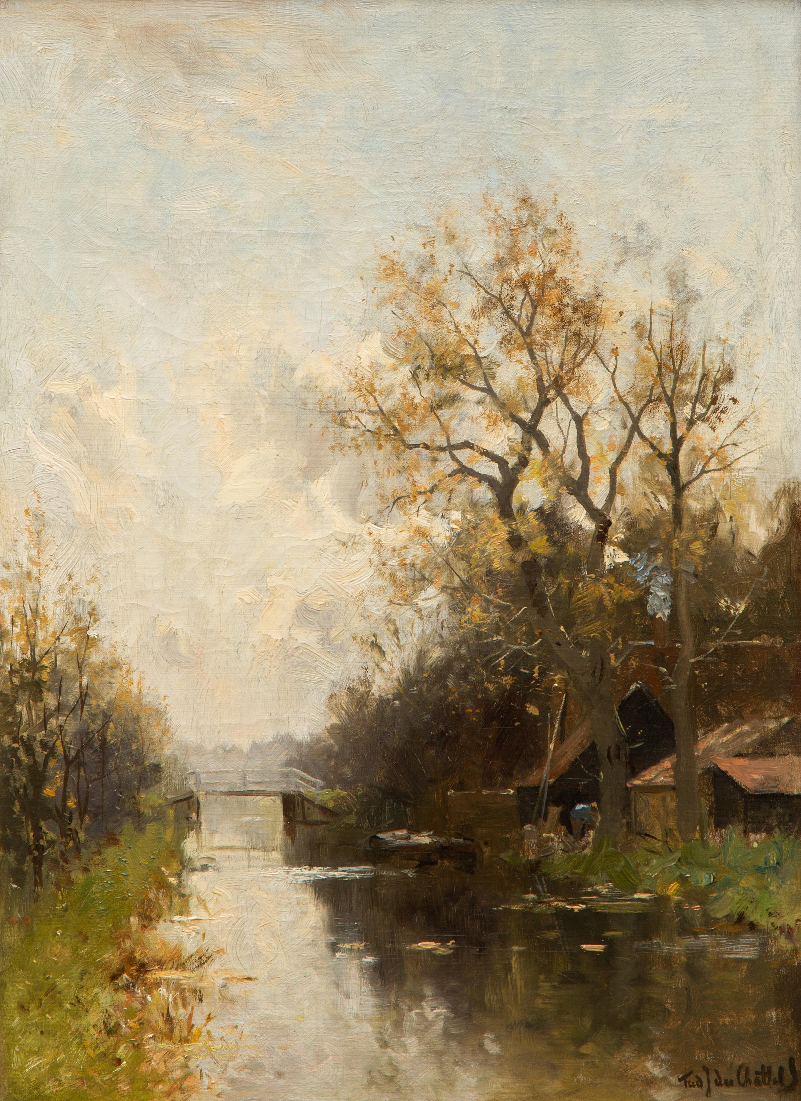A farm along a canal with a bridge beyond