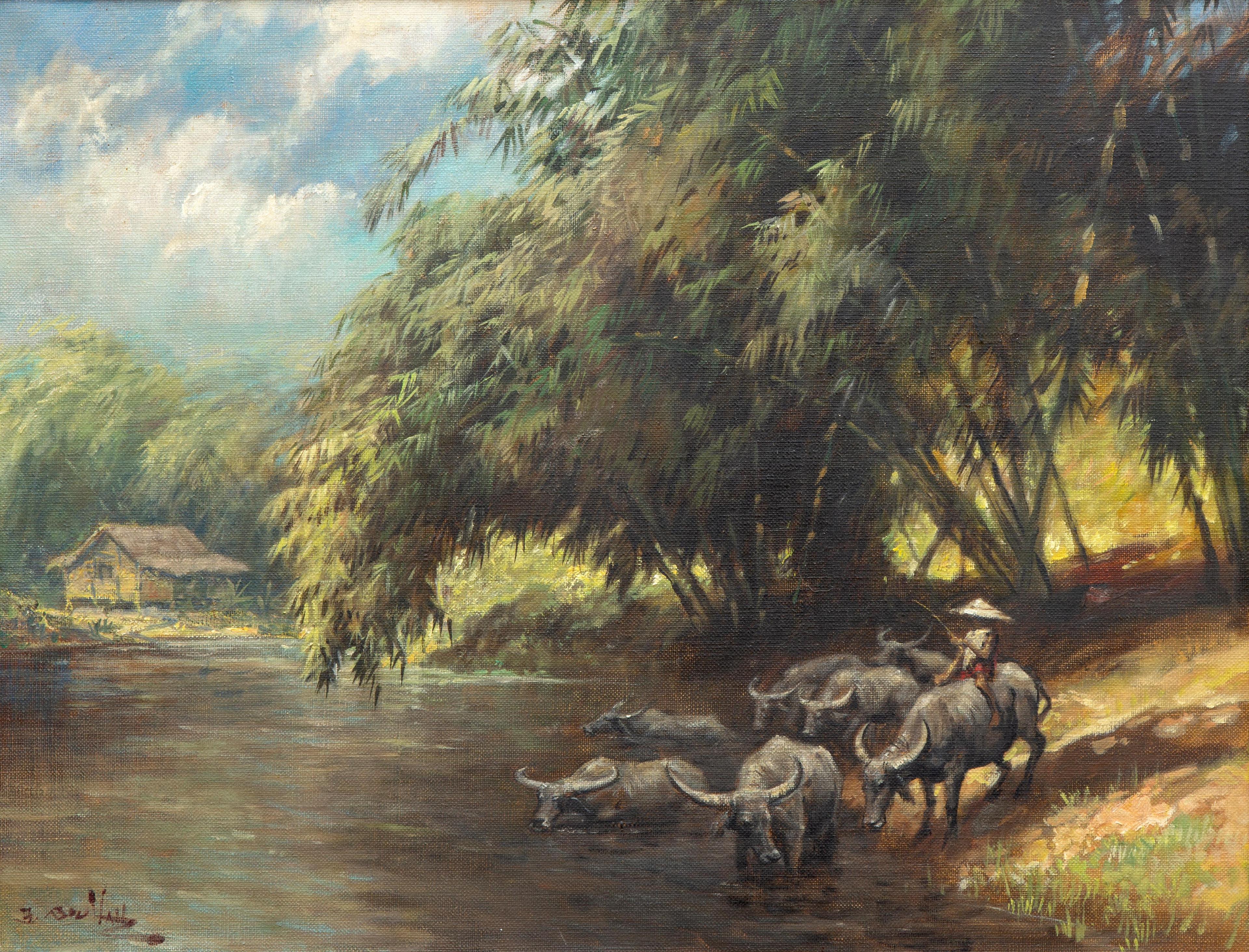 Buffaloes on a riverbank