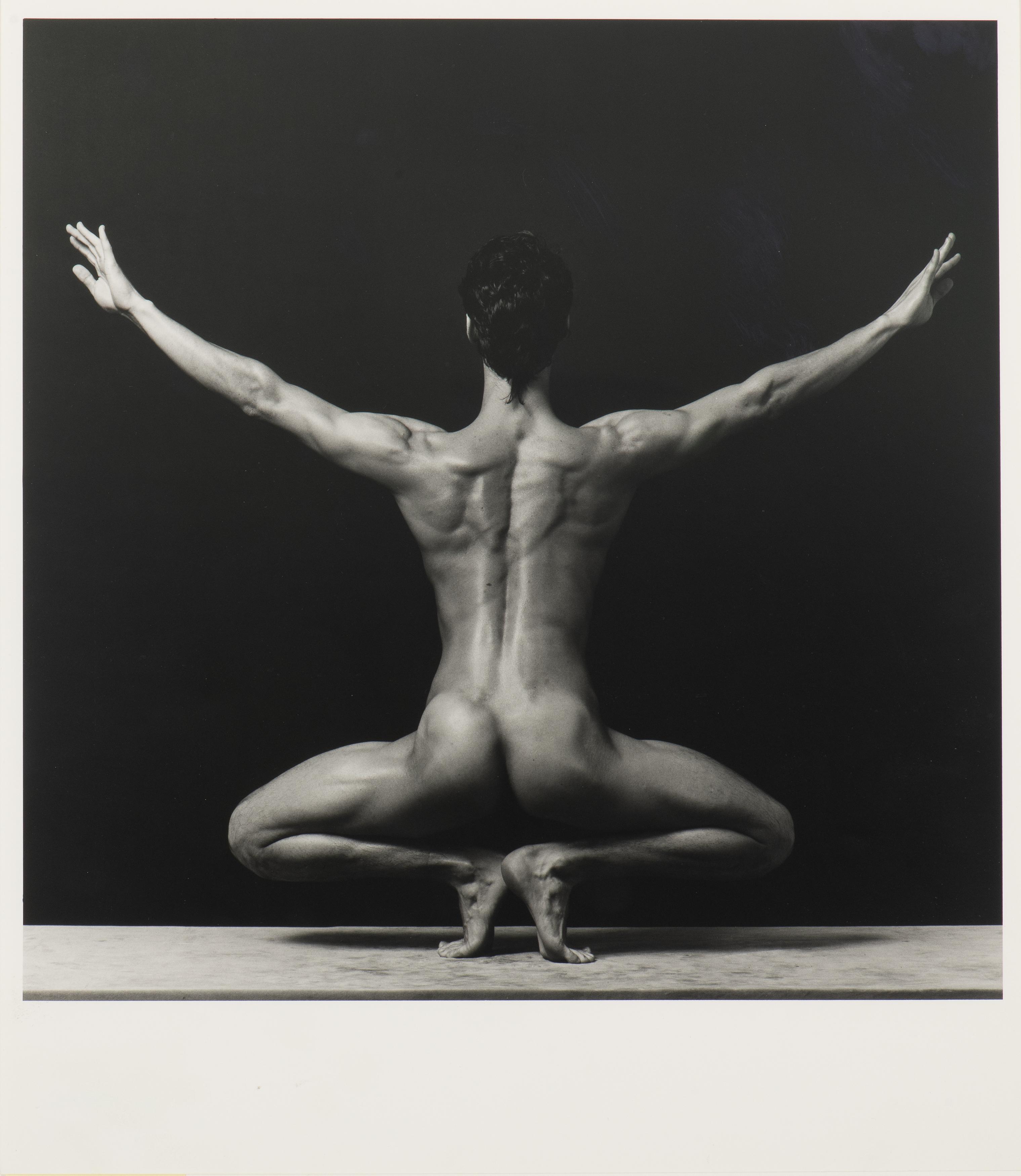 Male nude in balance Male nude in balance
