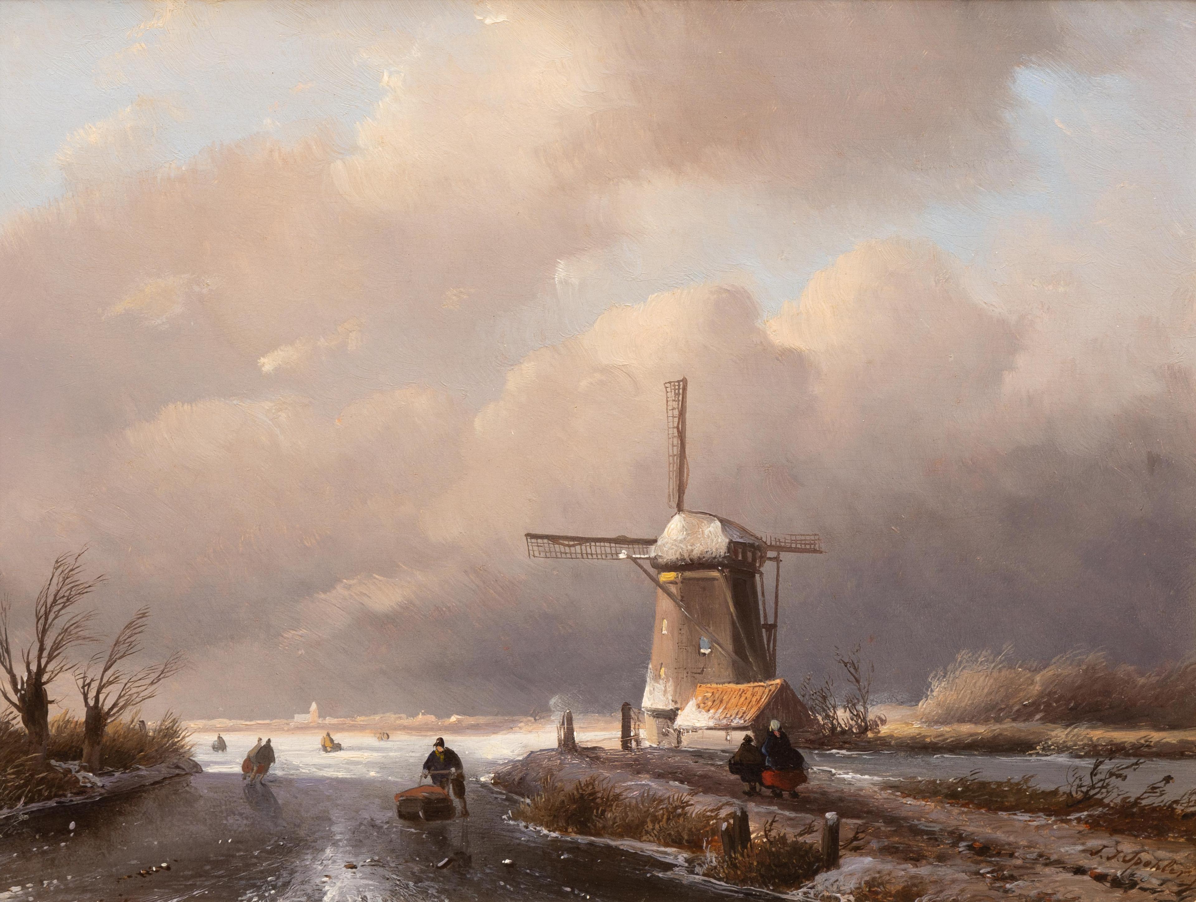 Skaters near the windmill on a cloudy day