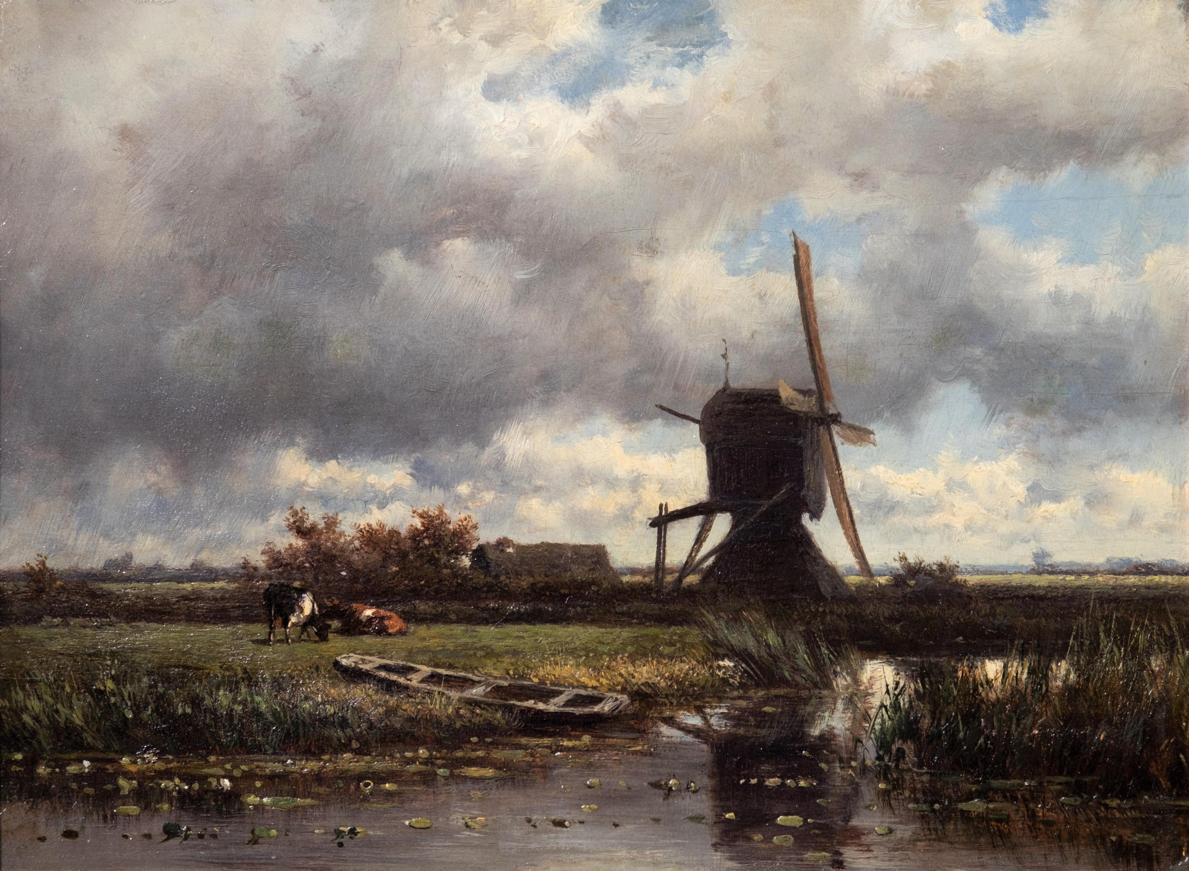Passing rain by a windmill in the polders near Abcoude