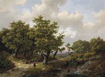 A wooded landscape with figures resting near a stream